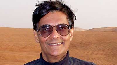 Headshot of Mohan Munasinghe