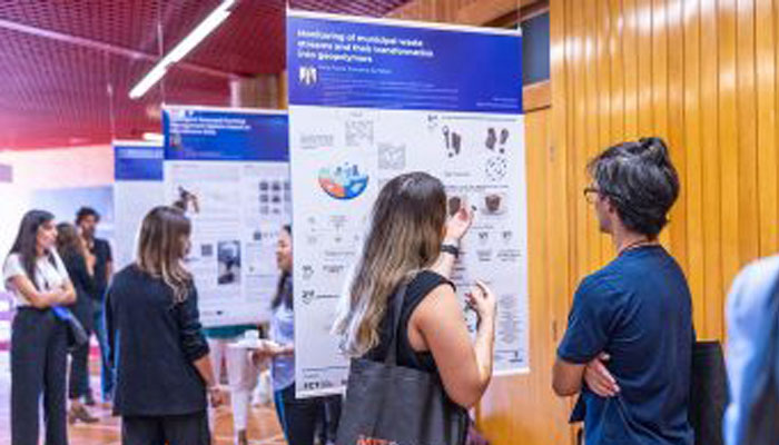 Photo of students at exhibition