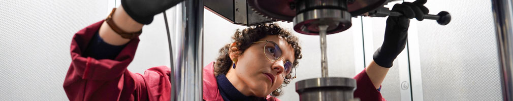Photo of woman working with machinary